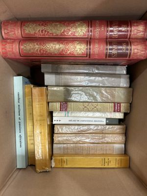 a box full of books that are sitting on a table