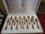 a box with a set of silverware in it on a table