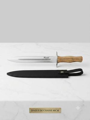 a knife sitting on top of a counter next to a box
