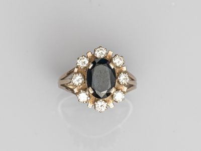 a sapphire and diamond cluster ring