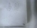 a white cloth with chinese writing on it next to a white cloth with chinese writing on it