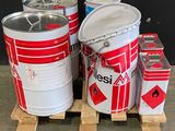 several cans of red and white paint sitting on a pallet