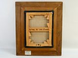 a wooden picture frame with a picture of a man and a woman