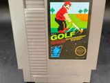 an old nintendo golf game is displayed on a table
