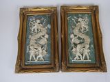 pair of antique carved picture frames of a man and woman on horseback