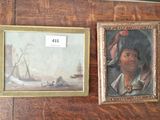 deux tableaux encadrés sur le mur d'une pièce