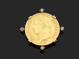 une pièce « sovereign » en or et une broche sertie de diamants