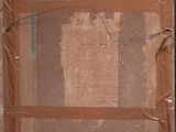 an old picture of a piece of paper taped to a wall