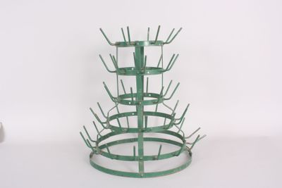 an image of a bottle holder made out of metal