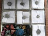 a box with rocks and stones in it on a table