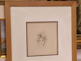 a picture of a picture of a woman with a flower in her hair and a picture of a woman with a flower in her hair