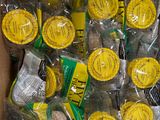 a cardboard box filled with lots of yellow and black items