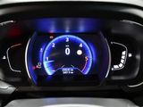 a close up of a car ' s dashboard with a digital gauge