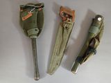 three different types of military items are displayed on a white surface