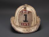 a fireman ' s hat with the number 1 on it