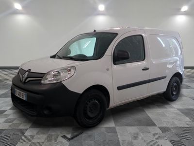 a picture of a white van parked on a checkered floor