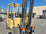 a forklift that is parked in a parking lot