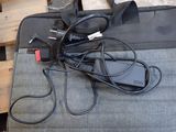 a laptop bag with a bunch of wires on top of it