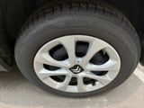 a close up of a tire on a car ' s rim