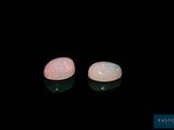 two oplites in the dark with a black background
