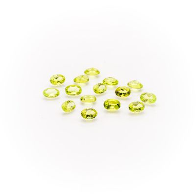 a bunch of yellow sapphires on a white background