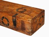 an old wooden box with a handle on it