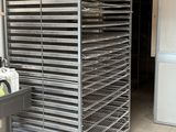 an image of a kitchen with a rack of food in it