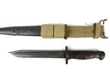 two different types of knives are shown on a white surface