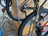 a bike that is sitting on a rack in the garage