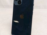 an apple iphone is sitting on top of a stand on a table