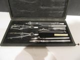 a black case with tools in it sitting on a table