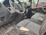 a picture of a car with a steering wheel and dashboard