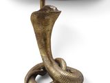 an image of a table lamp with a snake on top of it
