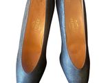 pair of women ' s blue shoes on a white background