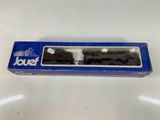 a close up of a toy train in a box on a table