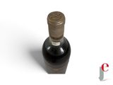 an image of a bottle of wine sitting on top of a white surface