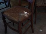 a chair that is sitting in the middle of a room