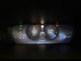 an image of a car dashboard with a digital display