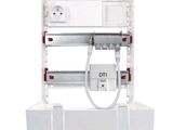 a picture of a white electrical device with a cord
