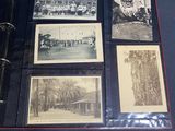 a lot of old photos on a binder on a table