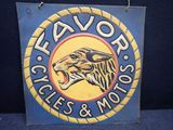 une pancarte sur laquelle sont inscrits « flavor cycles » et « motoss »