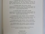an open book with a black and white title on it