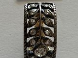 a picture of a silver ring with diamonds on it