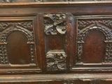 an old wooden chest sitting on top of a hard wood floor