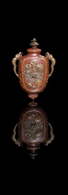 an image of a vase with a dragon on it