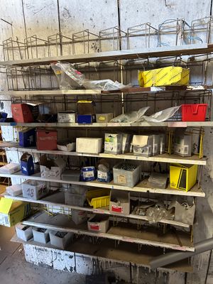 a shelf with many items on it in a room