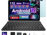 an image of a laptop with a keyboard, mouse, and other gadgets