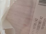 a close up of a label on a bag of clothing