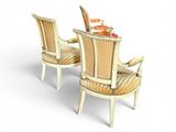 two chairs and a table with a bowl of oranges on top of it