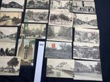 several old black and white photographs of a town with a clock tower